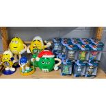 Five collectable M&M figures and 24 Vinylmation figures