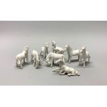 A group of eight Chinese Blanc de Chine porcelain horses, H. 8cm.