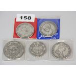 A group of six 19th century silver coins.