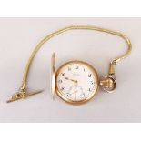 A 'The Argus' gold plated pocket watch with short chain, appears to be in w/o.