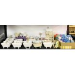 A quantity of dolls house bathroom furniture items.