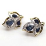 A pair of 925 silver gilt leaf shaped earrings set with marquise cut sapphires, L. 2cm.