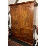 A Georgian mahogany linen press, W. 129, H. 193cm.