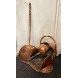 A Victorian copper coal scuttle with shovel and copper bed warmer.
