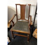 A Georgian mahogany chinoiserie armchair.