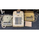 A vintage Addwell printer calculator, together with two vintage Dictaphones.