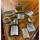 A collection of ten vintage lighters.