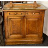 A handmade oak two door and two drawer 19th century cabinet with custom made plate glass top, 103