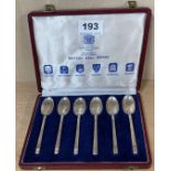 An unusual cased set of six hallmarked silver teaspoons, each bearing a different British hall