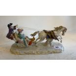 An early 20th century Dresden porcelain figure of a horse and sleigh, L. 34cm, H. 16cm. A/F to one