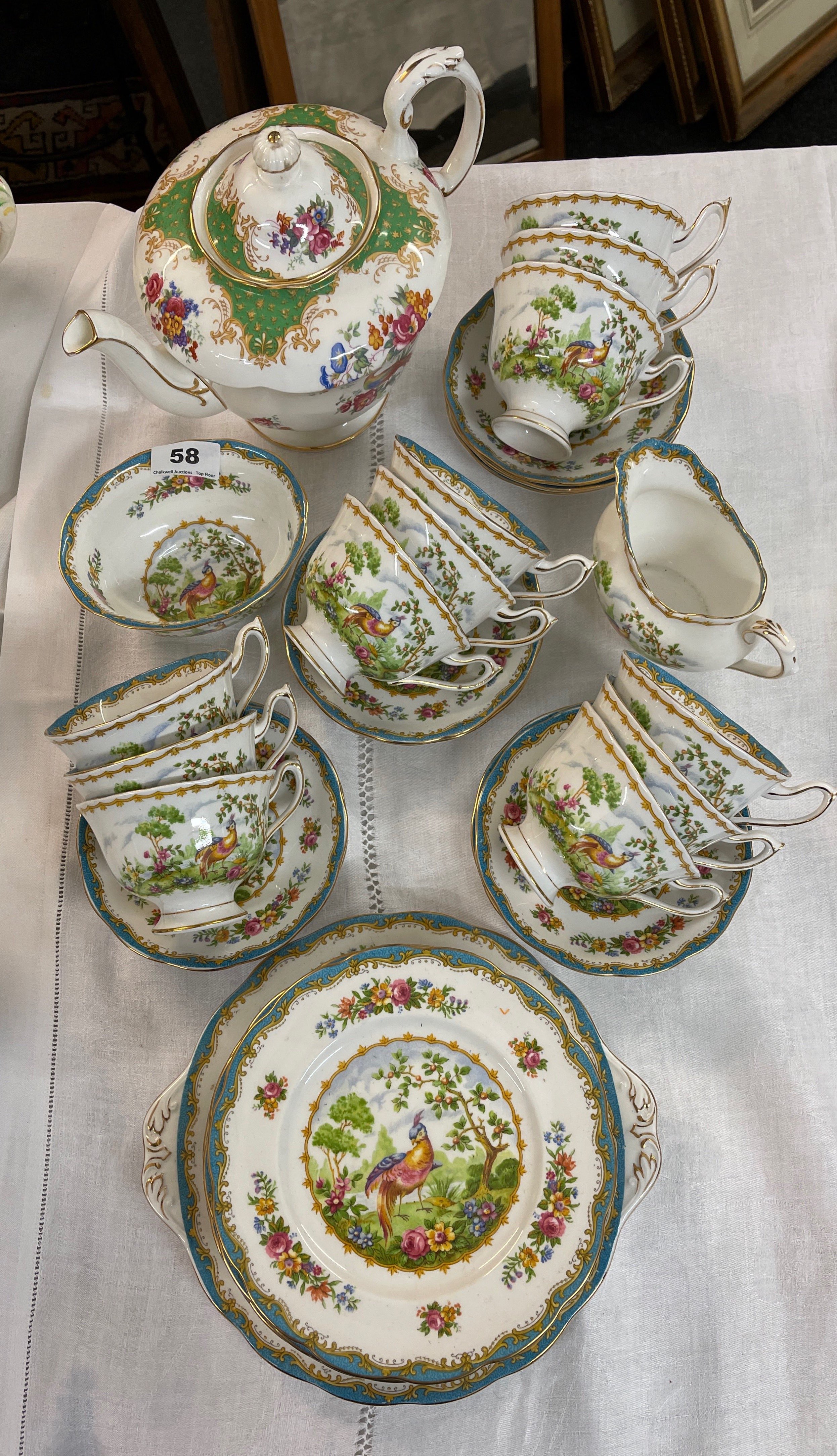 A very pretty Royal Albert Chelsea bird pattern twelve setting tea set, together with a similar