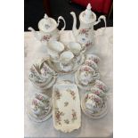 An extensive (mostly twelve setting) Royal Albert Moss Rose pattern tea set (some unmarked).