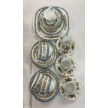A Crown Staffordshire Tunis pattern part tea set and three coffee cans.