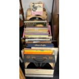 A large collection of mixed 78, 33 and 45 RPM records.
