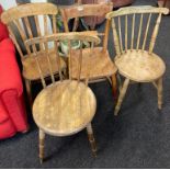 A group of four 19th century country kitchen chairs.