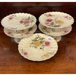 A set of five Edwardian cake stands, Dia. 26cm.