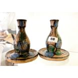 A pair of Danico Danish pottery candlesticks, H. 15cm. One with minor chip to rim.