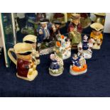 A group of Victorian Staffordshire porcelain flatbacks and other china items.