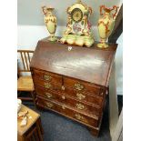 A Georgian mahogany five drawer bureau, 92 x 108cm.