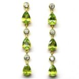 A pair of 925 silver gilt drop earrings set with oval cut peridots and white stones, L. 4.3cm.