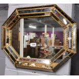 A small Venetian style mirror, 50 x 40cm.