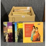 A box of classical and soundtrack LP records.