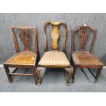 Three early hall chairs.