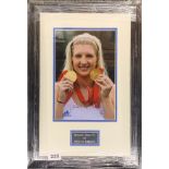 Autograph interest: A framed signed photograph of Rebecca Adlington OBE (British b. 1989). Frame