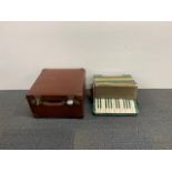 A Mastertone piano accordion (A/F) and case.