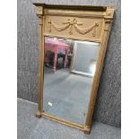 A Regency gilt wood over mantle mirror, 101 x 54cm.