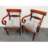 A pair of fine Georgian mahogany armchairs.