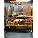 A large frame mounted collection of percussion instruments etc.