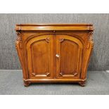 A pretty 19th century walnut two door cabinet with drinks slide, 91 x 37 x 85cm.