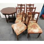 A set of six Edwardian mahogany dining chairs, together with an Edwardian side table.