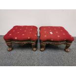 A pair of upholstered cast metal footstools, 36 x 36 x 20cm.