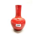 A Chinese sang de beouf glazed porcelain vase, H. 23cm (6 character mark to base).