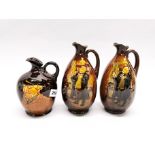 Three Royal Doulton series ware jugs (two slightly A/F to spout), H. 20cm.