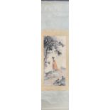 A Chinese ink and watercolour mounted on scroll of a beautiful woman taking a walk in the woods.