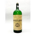 An interesting large 1975 empty Pontet-Latour wine bottle, H. 52cm.