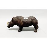 An interesting very realistic Richmond Crafts composition model of a rhinoceros, L. 31cm, H. 13cm.
