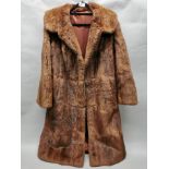 A vintage ladies' fur coat, understood to be European red squirrel, L. 109cm.