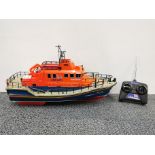 An RNLI Severn class radio controlled lifeboat 'volunteer spirit', L. 46cm, H. 26cm.