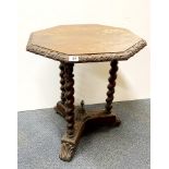 An interesting 19th century carved oak gothic style octagonal side table, 60 x 60 x 67cm.