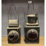 Two early railway signalling lamps, H. 52cm.