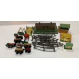 A Meccano 0 gauge tin plate train set and accessories.
