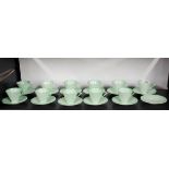 An art Deco Shelley coffee set, comprising of eleven cups and twelve saucers.