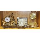 An Art Deco mantle clock, together with a torsion clock, bigger clock and barometer.