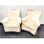 A pair of upholstered bedroom chairs.