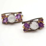 A pair of 925 silver earrings set with amethyst and cabochon cut moonstones, L. 2.1cm.