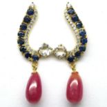 A pair of 925 silver gilt drop earrings set with sapphires and pear cabochon cut rubies, L. 4cm.